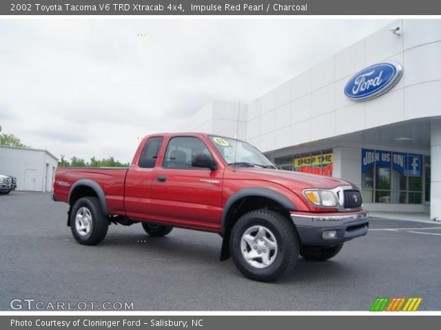 2002 Toyota Tacoma V6 TRD Xtracab 4x4 in Impulse Red Pearl