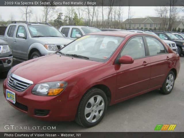 2009 Kia Spectra EX Sedan in Spicy Red Metallic