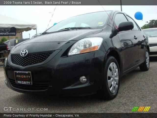 2009 Toyota Yaris S Sedan in Black Sand Pearl