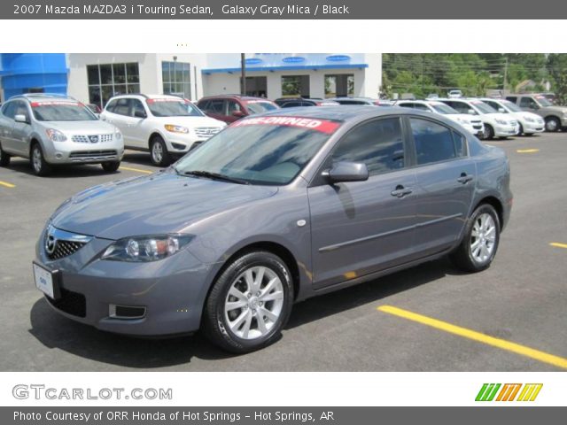 2007 Mazda MAZDA3 i Touring Sedan in Galaxy Gray Mica