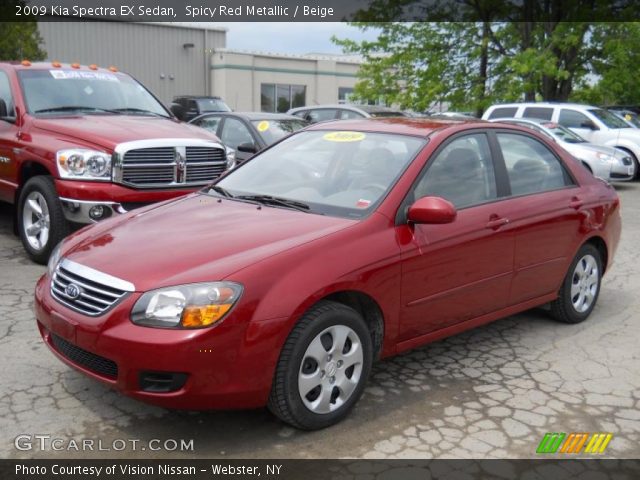 2009 Kia Spectra EX Sedan in Spicy Red Metallic