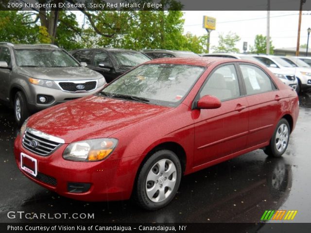 2009 Kia Spectra EX Sedan in Spicy Red Metallic