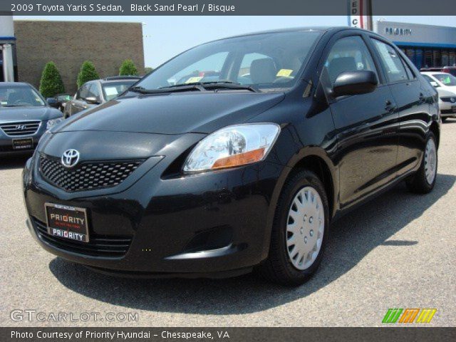 2009 Toyota Yaris S Sedan in Black Sand Pearl