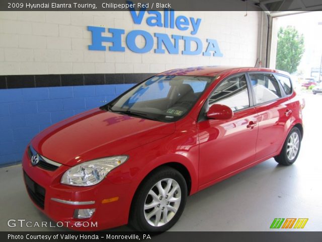 2009 Hyundai Elantra Touring in Chilipepper Red