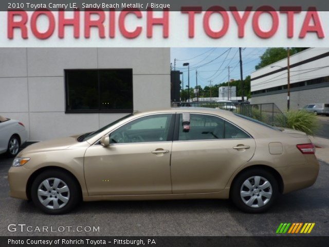 2010 Toyota Camry LE in Sandy Beach Metallic