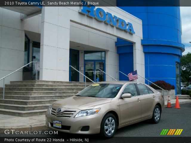 2010 Toyota Camry LE in Sandy Beach Metallic