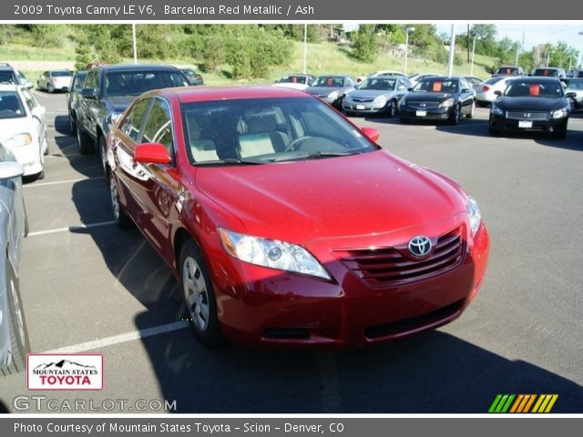 2009 Toyota Camry LE V6 in Barcelona Red Metallic