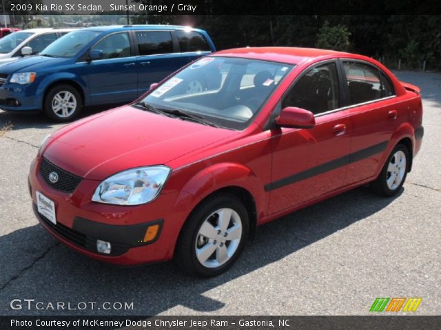 2009 Kia Rio SX Sedan in Sunset Orange