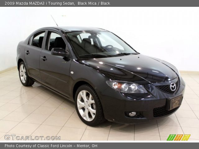 2009 Mazda MAZDA3 i Touring Sedan in Black Mica