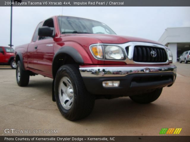 2004 Toyota Tacoma V6 Xtracab 4x4 in Impulse Red Pearl