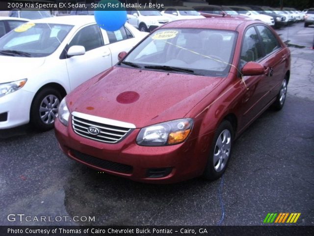 2009 Kia Spectra EX Sedan in Spicy Red Metallic
