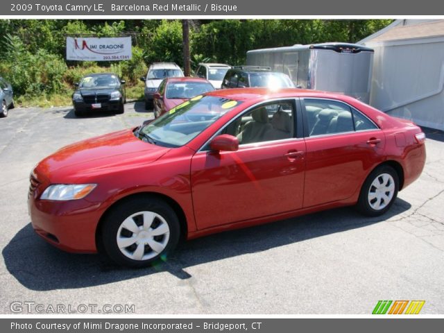 2009 Toyota Camry LE in Barcelona Red Metallic