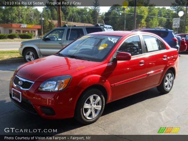 2010 Kia Rio LX Sedan in Tropical Red