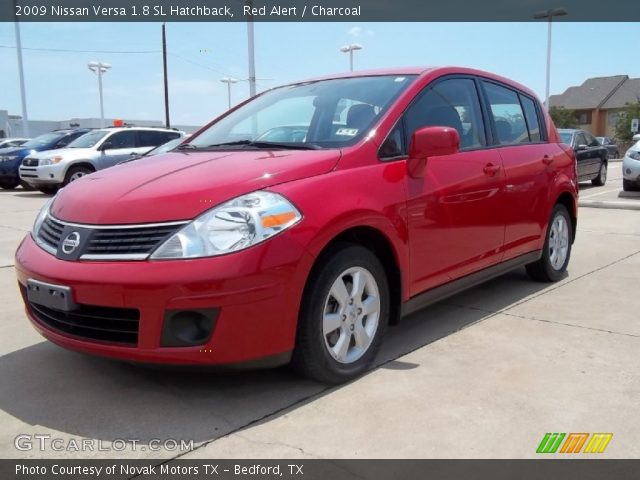 2009 Nissan Versa 1.8 SL Hatchback in Red Alert