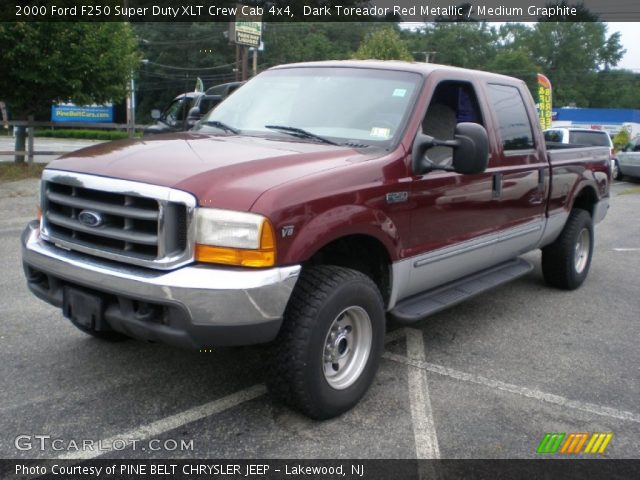 2000 Ford F250 Super Duty XLT Crew Cab 4x4 in Dark Toreador Red Metallic