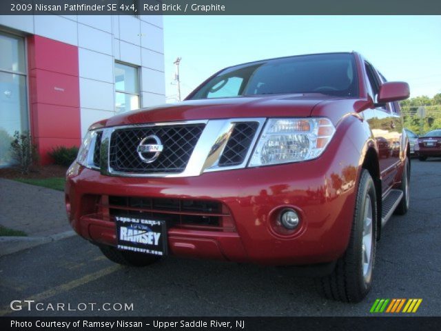 2009 Nissan Pathfinder SE 4x4 in Red Brick
