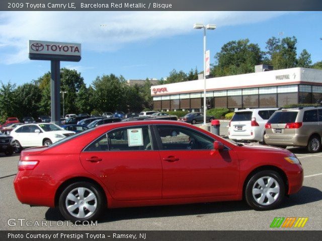 2009 Toyota Camry LE in Barcelona Red Metallic