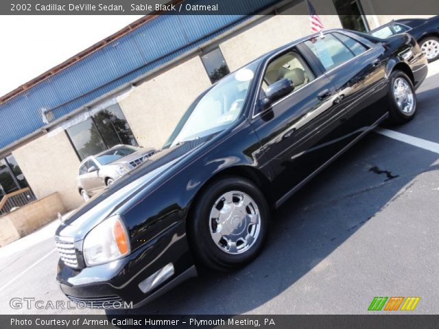 2002 Cadillac DeVille Sedan in Sable Black