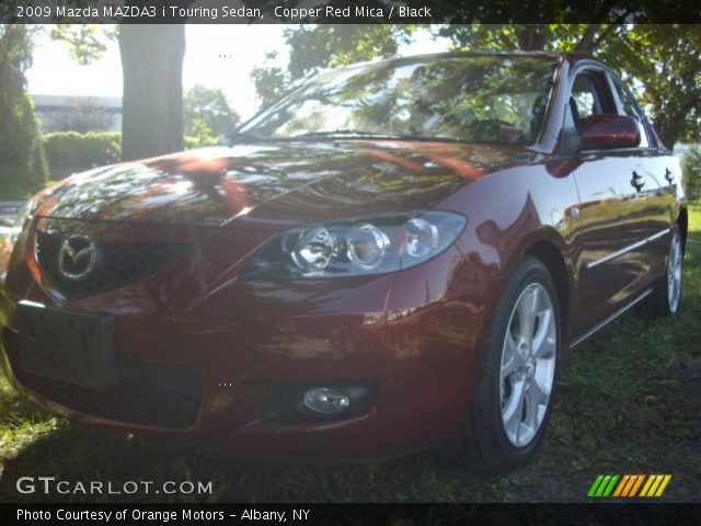 2009 Mazda MAZDA3 i Touring Sedan in Copper Red Mica