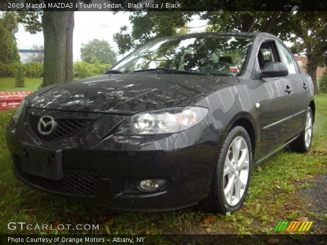 2009 Mazda MAZDA3 i Touring Sedan in Black Mica