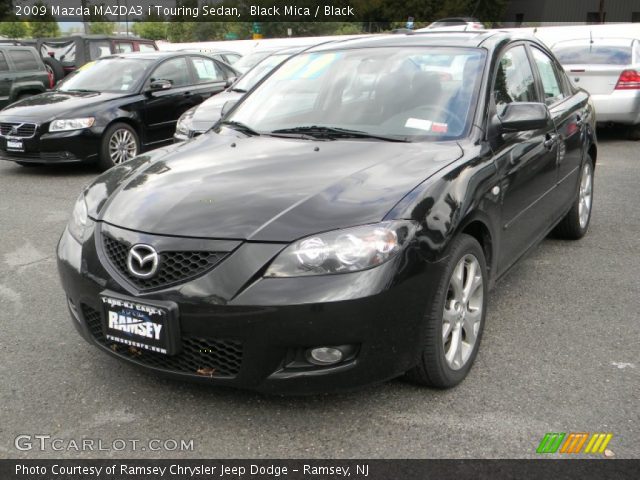 2009 Mazda MAZDA3 i Touring Sedan in Black Mica