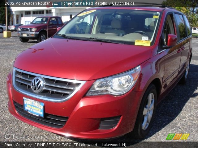 2009 Volkswagen Routan SEL in Pomegranate Red Metallic