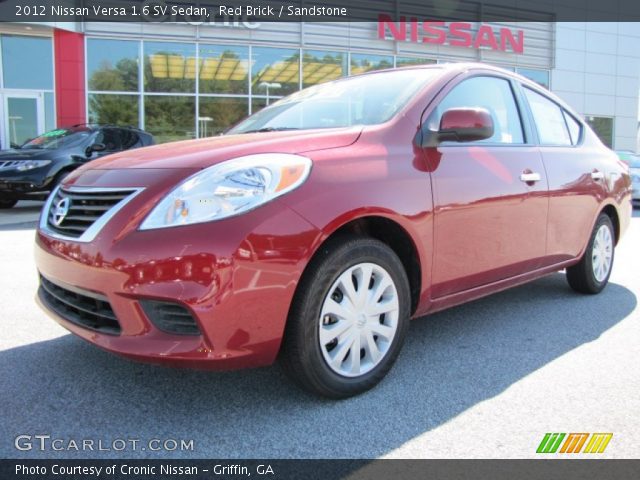 2012 Nissan Versa 1.6 SV Sedan in Red Brick