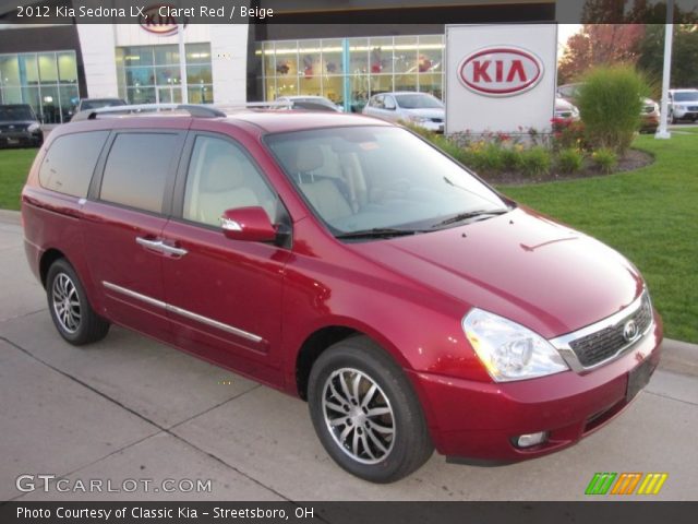 2012 Kia Sedona LX in Claret Red