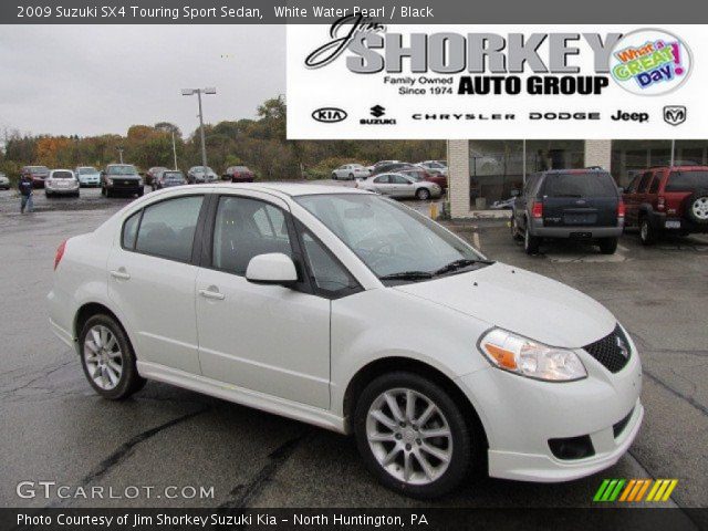 2009 Suzuki SX4 Touring Sport Sedan in White Water Pearl