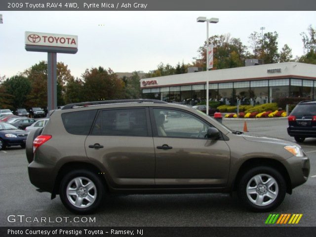 2009 Toyota RAV4 4WD in Pyrite Mica