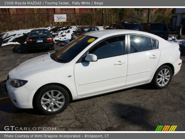 2008 Mazda MAZDA3 i Touring Sedan in Rally White