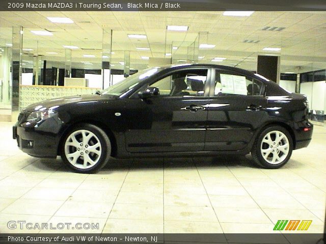 2009 Mazda MAZDA3 i Touring Sedan in Black Mica