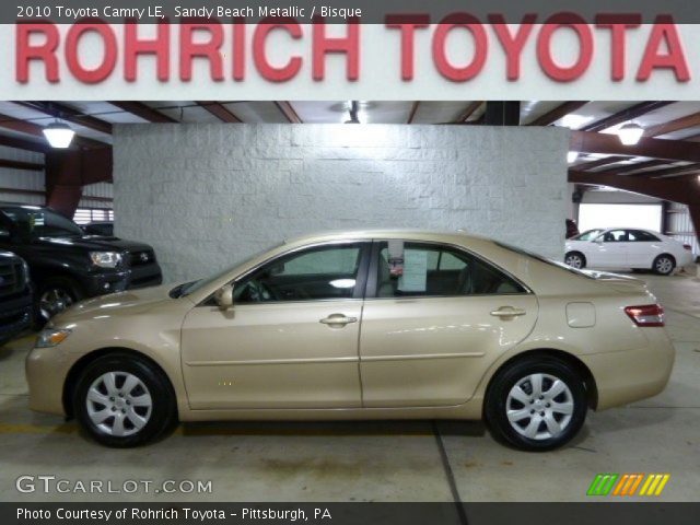 2010 Toyota Camry LE in Sandy Beach Metallic