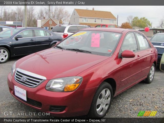 2009 Kia Spectra EX Sedan in Spicy Red Metallic