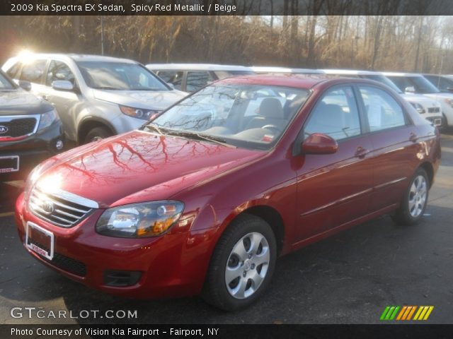 2009 Kia Spectra EX Sedan in Spicy Red Metallic