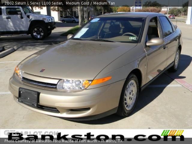 2002 Saturn L Series L100 Sedan in Medium Gold