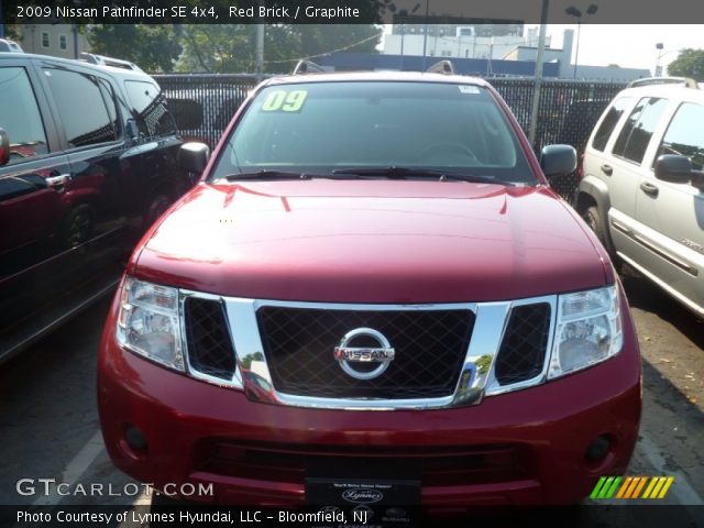 2009 Nissan Pathfinder SE 4x4 in Red Brick
