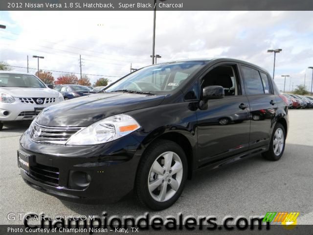2012 Black nissan versa hatchback #5