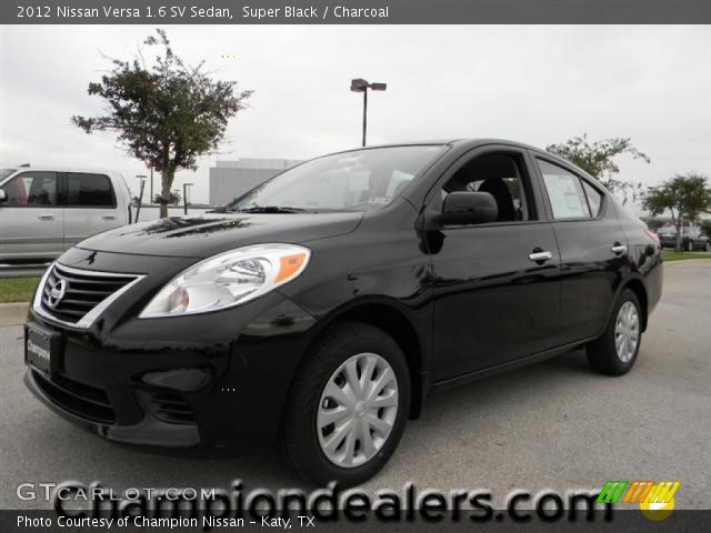 2012 Nissan versa sedan black #6