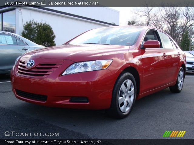 2009 Toyota Camry LE in Barcelona Red Metallic