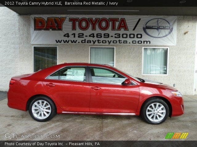 2012 Toyota Camry Hybrid XLE in Barcelona Red Metallic