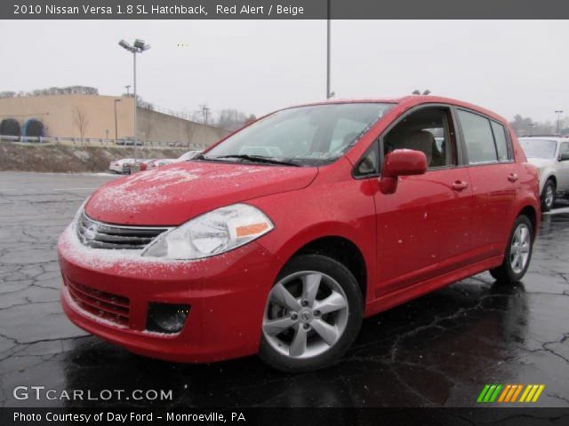 2010 Nissan Versa 1.8 SL Hatchback in Red Alert