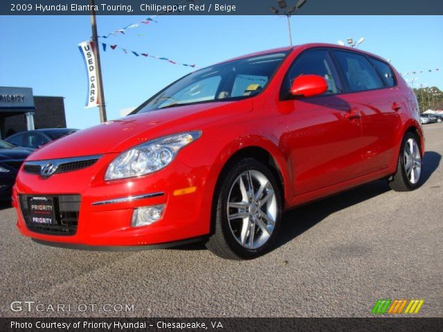 2009 Hyundai Elantra Touring in Chilipepper Red