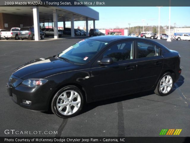 2009 Mazda MAZDA3 i Touring Sedan in Black Mica