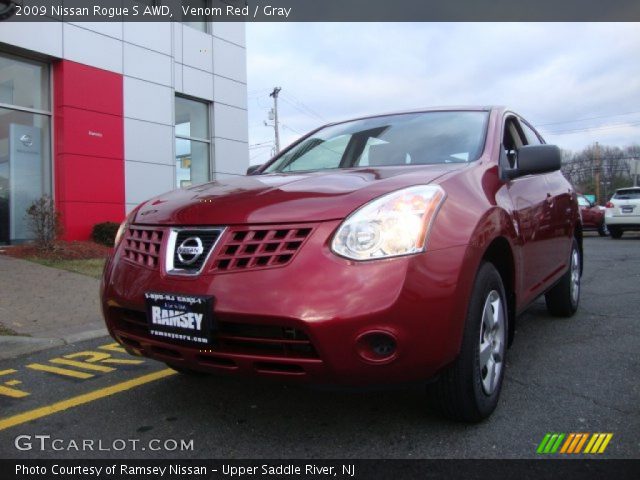 2009 Nissan Rogue S AWD in Venom Red