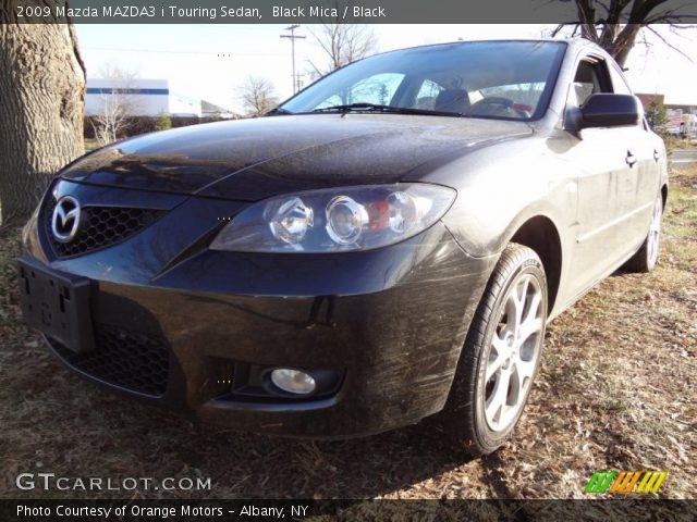 2009 Mazda MAZDA3 i Touring Sedan in Black Mica