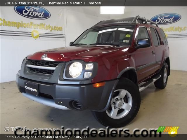 2004 Nissan Xterra XE in Thermal Red Metallic