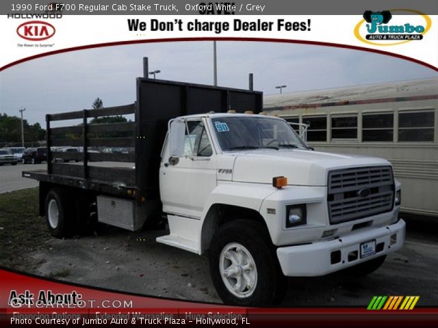 1990 Ford F700 Regular Cab Stake Truck in Oxford White