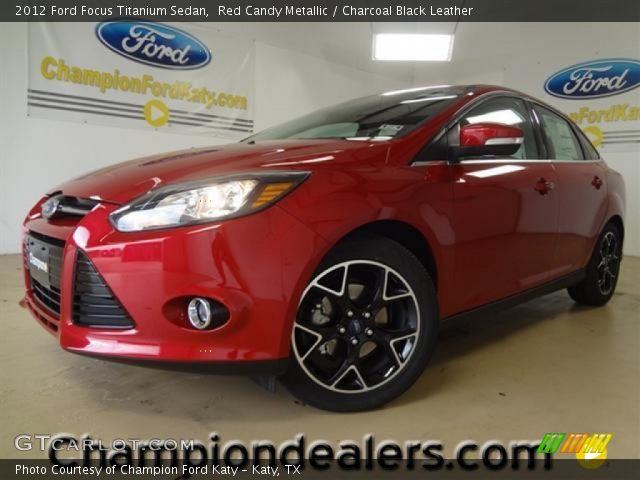 red-candy-metallic-2012-ford-focus-titanium-sedan-charcoal-black