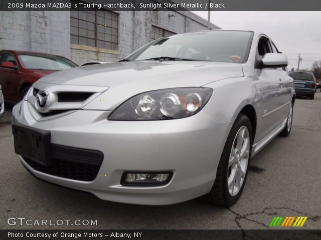 2009 Mazda MAZDA3 s Touring Hatchback in Sunlight Silver Metallic